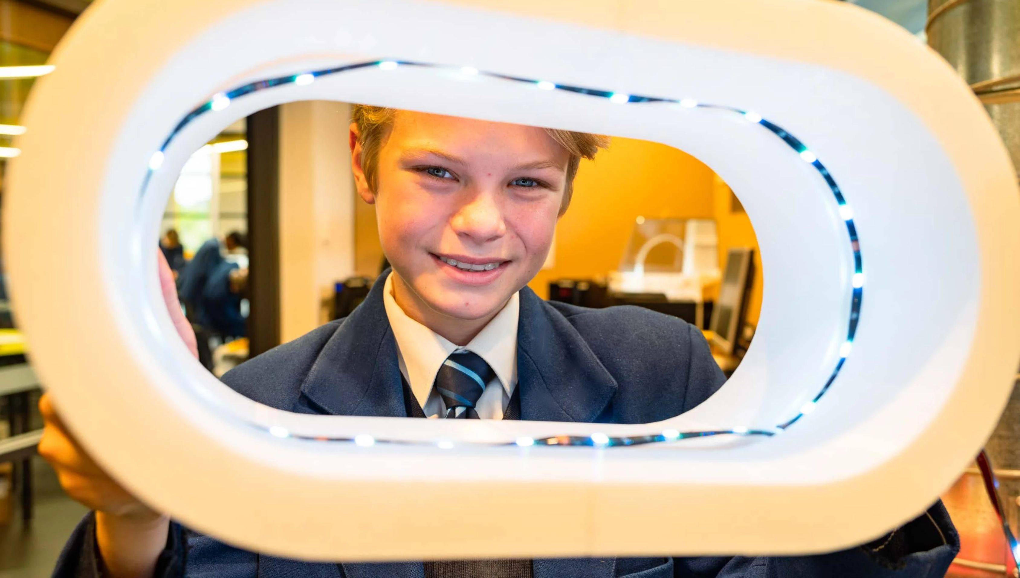 A student holding a light at Mazenod College Perth WA